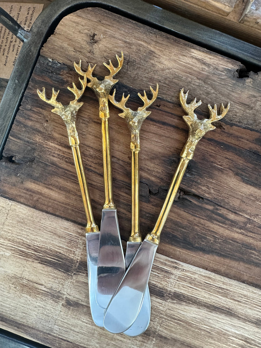 Stainless Steel and brass knife, set of 4 with reindeer tops